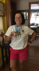 Kimberley: This was my first virtual run.  Knowing I had this goal kept me motivated.  LOVE the medal.