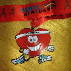Janet: "Thanks! Got my AHA Virtual 10K medal in the mail today."