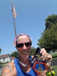 Valerie: I am the daughter, sister, wife and mother of a veteran. Perfect way to get my half marathon training run for the MCM  and honor those that I love and those that sacrifice so much.