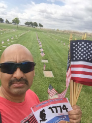 Gabriel: "Not a record breaking time but I did my miles while placing flags for our heroes at Riverside National Cemetery."