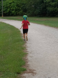 Naomi: My partner for the Shark Tooth 5k. Not sure about the Ninja Turtle helmet but #SafetyFirst
