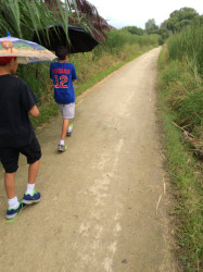 Melissa: My Boys and I doing or first Virtual Run/Walk...in the rain!