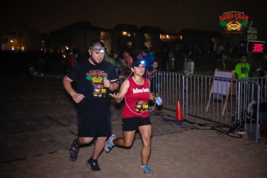 Cynthia: "Crossing the finish line in South Padre Island, TX"