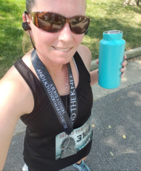 Jeanna: Arya Stark Fan, my first medal for a 5K and it is awesome.