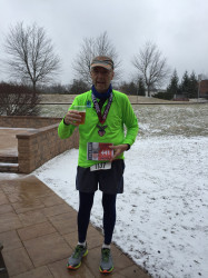 Michael: Snow and 34 degrees.  45 seconds faster than 1/1/18.  Hillier course.  Good beer afterwards.  Time to actually train.
