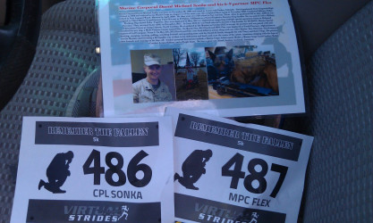 Angela and Chris: "Ran in honor of CPL Sonka and his K-9 partner MPC Flex who were KIA in Afghanistan on May 4, 2013."