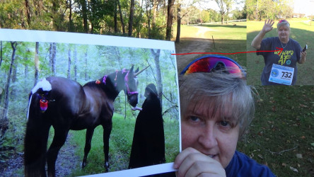 Karen: When the 5K was announced I had planned to take a 5K trail ride with my buddy Dylan there on the left, who was at the time that picture was taken trying to prove that Unicorns fart rainbows.  We lost him to colic very suddenly on 9/15, so he couldn't take me on that ride.  We received his ashes and a special reminder of him back this week, so on the right is me taking him on a ride instead, in the form of the glass bead made with his ashes around my neck.  I know you are "Racking On" in heaven buddy.  Shop Till You Drop aka Dylan 03/26/1995 - 09/15/2016