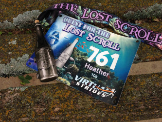 Heather: I dug deep early this extremely humid morning and hunted high and low along Pathfinder on my 10K Quest for the Lost Scroll. Found it!